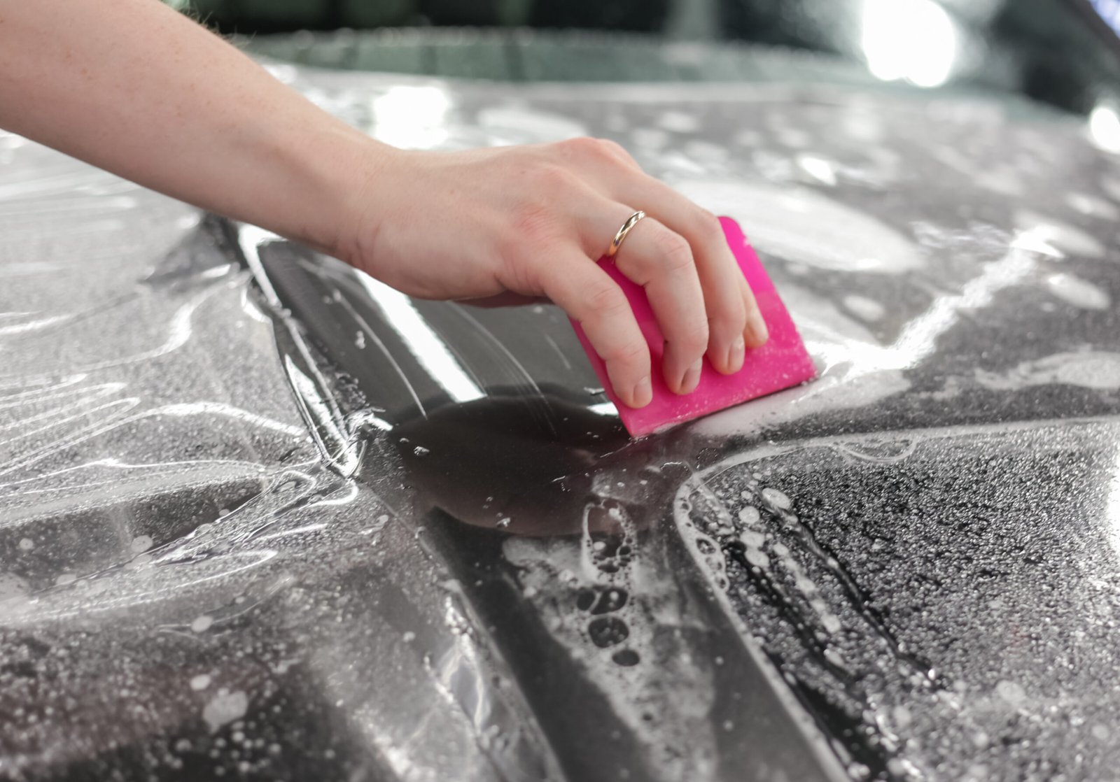 car-wrapping-specialist-applies-polyurethane-film-car